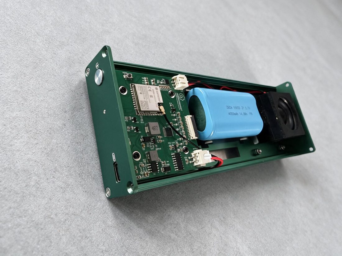 Inside view of the NoorConnect control module with its speaker, battery and circuit board